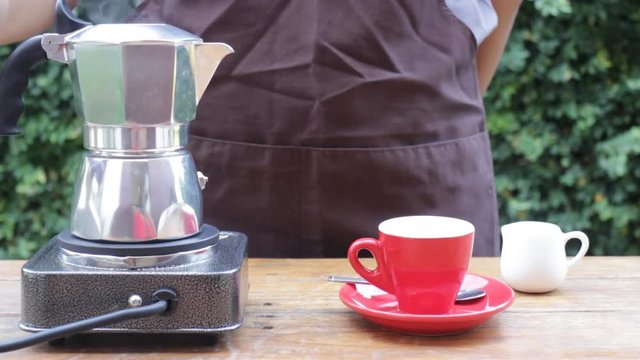 Homemade hot espresso drink by moka pot, stock video