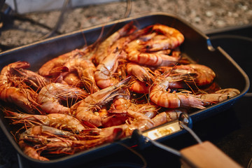 Cooking tiger prawns grilled. Close-up. Background.