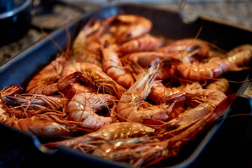 Cooking tiger prawns grilled. Close-up. Background.