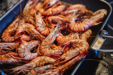 Cooking tiger prawns grilled. Close-up. Background.