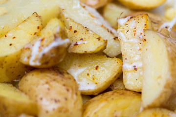 Baked potato slices with spices