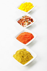 Different spices in a row