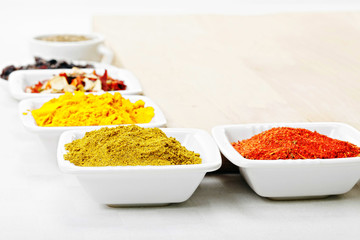 Spices at wooden board