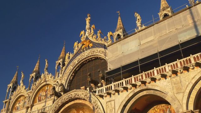 sun light famous venice city san marko basilica cathedral front rooftop 4k italy
