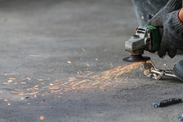 Labour Working By Tool / Worker Hands Of Labour Working By Tool Cutting Steel In Workshop.