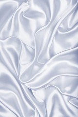 Smooth elegant grey silk or satin texture as background
