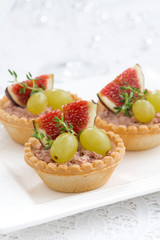 tartlets with liver pate and fruit, vertical