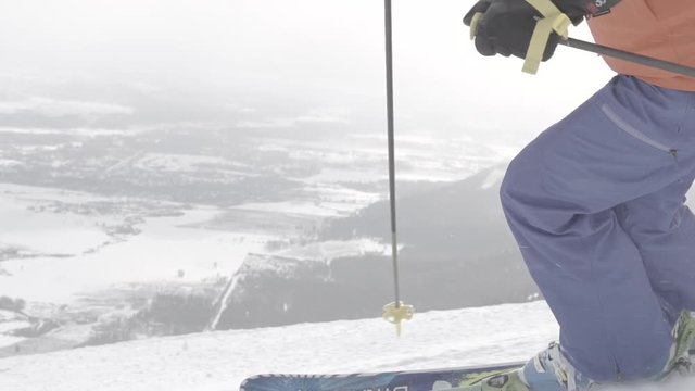 upclow slow motion ski turn on powdery groomer