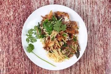 Thai food, Fried ginger with Tilapia fish  (Call Pla Nil Pad Khi