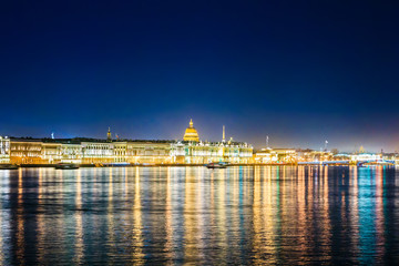 Fototapeta na wymiar Quay of the Neva River in Saint Petersburg, Russia. Night city, embankment, water.