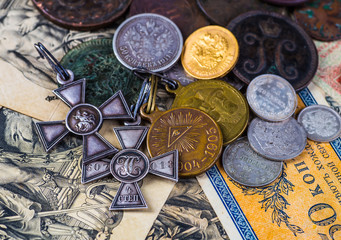 Fototapeta na wymiar Gold and silver coins of the Russian Empire in the background ko