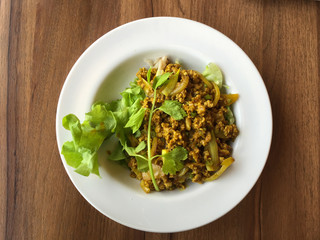 top view of curry pork noodle in Thai style on wood table