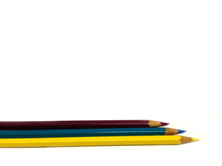 three pastel standing out from , isolated on white background. Individuality concept.