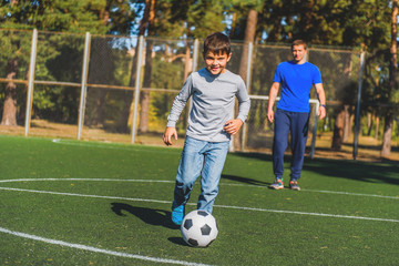 I like playing football with my dad