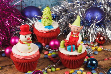 Christmas cupcakes with colored decorations