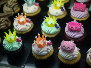 Fancy halloween cupcakes with Chanel bags and crowns