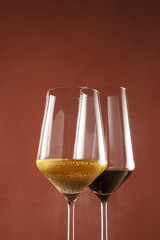 Red and white wine in glasses 