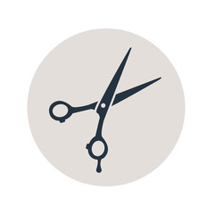 Icono plano tijeras peluquero en circulo gris