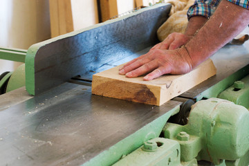 Carpenter tools on wooden table with sawdust. Carpenter workplace top view