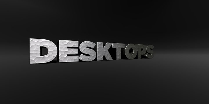 DESKTOPS - hammered metal finish text on black studio - 3D rendered royalty free stock photo. This image can be used for an online website banner ad or a print postcard.