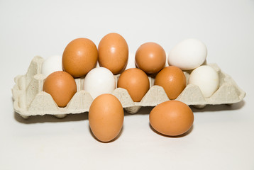 Many Chicken eggs is in a carton for sale.
