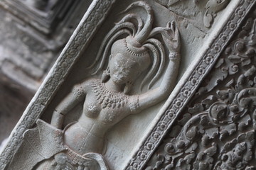 Wall engravings/relief of temple devi dancers at Angkor wat in Cambodia