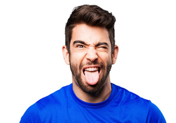 Fototapeta premium young man showing tongue