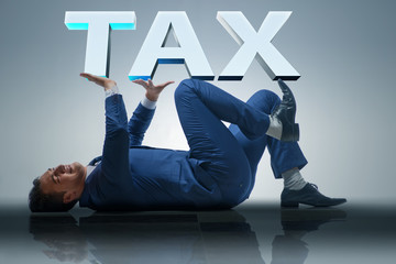 Man under the burden of tax payments