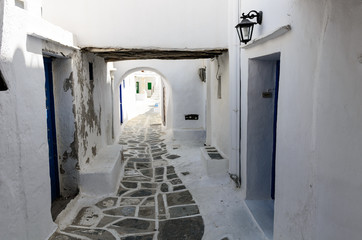 Traditional cycladic whitewashed street, Sifnos, Cyclades, Greec © masquerade75