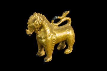 Lion ancient statue - Golden lion statue in Thai style with isol