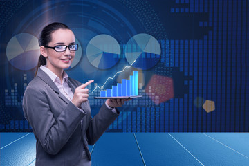 Businesswoman in stock trading business concept