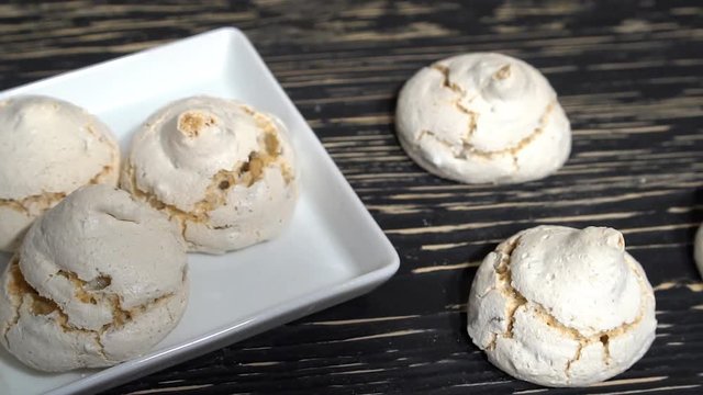 lot of white meringue cakes.