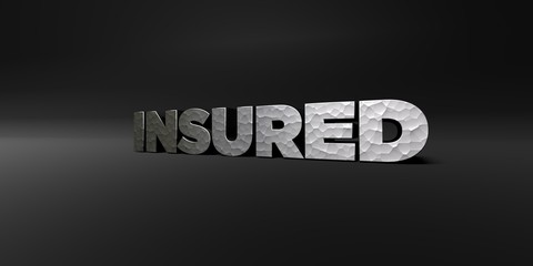 INSURED - hammered metal finish text on black studio - 3D rendered royalty free stock photo. This image can be used for an online website banner ad or a print postcard.
