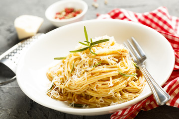 Pasta with tomato sauce and fresh rosemary