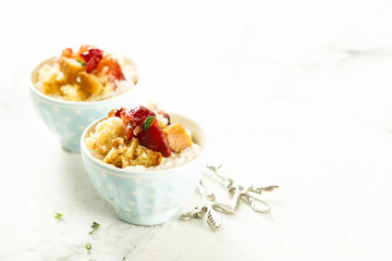 Plum dessert with cream cheese and biscuit