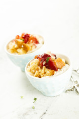 Plum dessert with cream cheese and biscuit