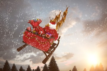 Composite image of high angle view of santa claus riding on sled