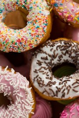 Tasty doughnuts with sprinkles