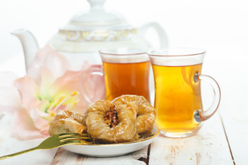  traditional eastern desserts on wooden background