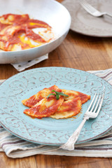 Mezzelune handmade pasta with tomato sauce