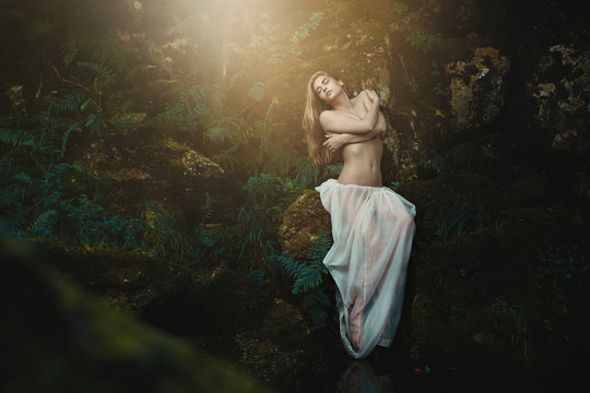 Forest nymph among ferns