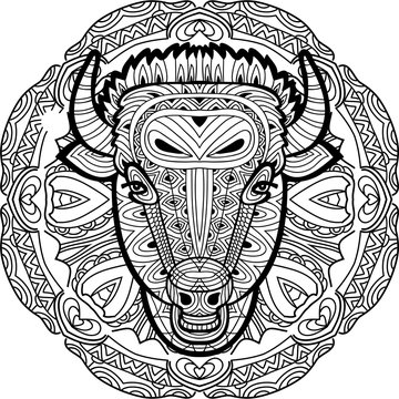 Painted bull on a background of circular pattern. Coloring page