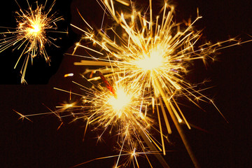 Drei brennende Wunderkerzen