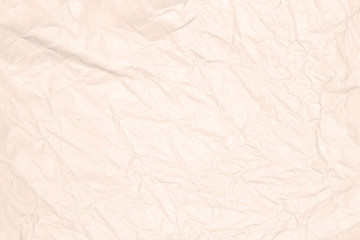 Recycled crumpled light brown paper texture or paper background.  Closeup light brown paper detail for design with copy space for text or image.