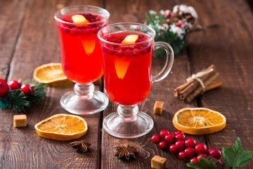 Christmas card. hot spicy Christmas drink of cranberry and spice