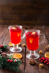 Christmas card. hot spicy Christmas drink of cranberry and spice