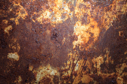 Rusty metal texture or rusty metal background. Rusty metal is caused by moisture in the air. Grunge retro vintage of rusty metal plate. Abstract rusty metal for design with copy space.