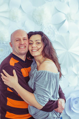 happy and beautiful husband and wife stands together