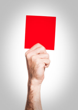 Carton rouge: main tenant un carr&eacute; rouge - penalty
