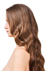 Naklejka premium Woman with wavy brown hair isolated on white background.